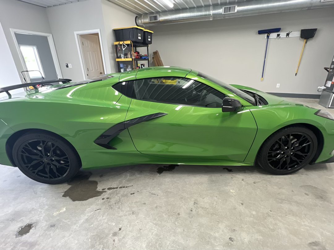Side profile of the green C8 Corvette Stingray