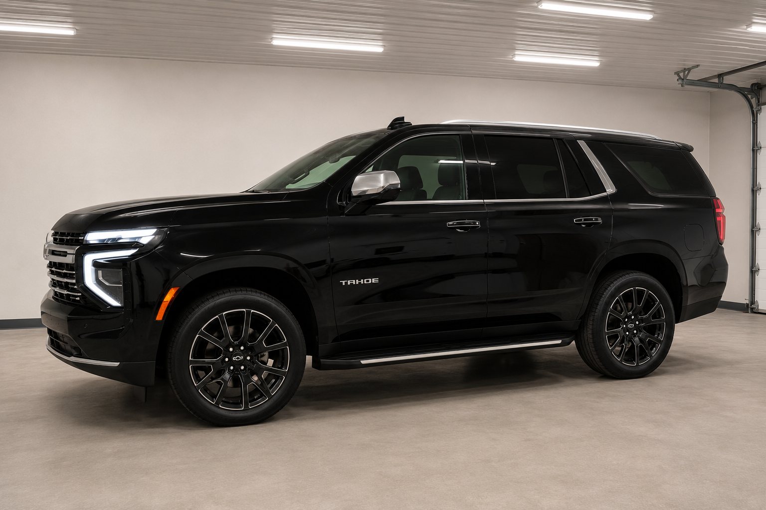 Side profile of the black Chevrolet Tahoe Premier